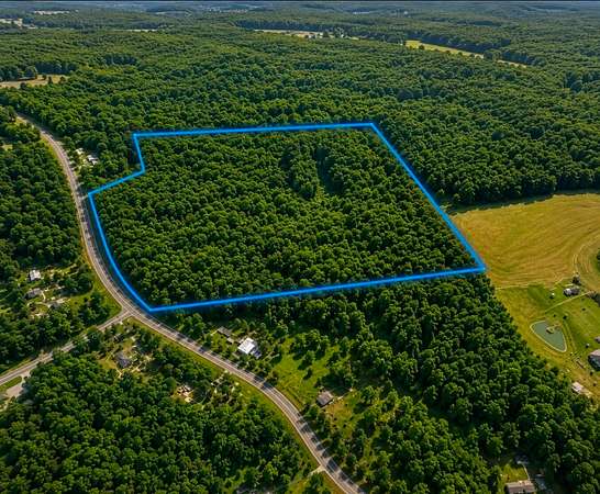 17.6 Acres of Land for Sale in Hollow Rock, Tennessee