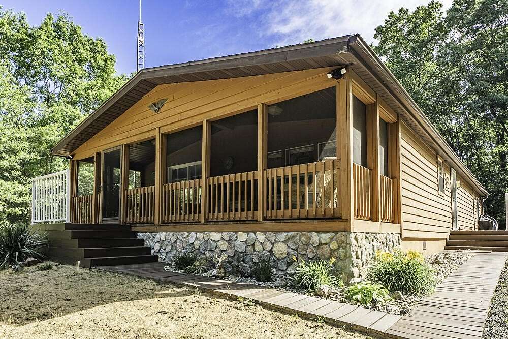19.4 Acres of Recreational Land with Home for Sale in Hart, Michigan