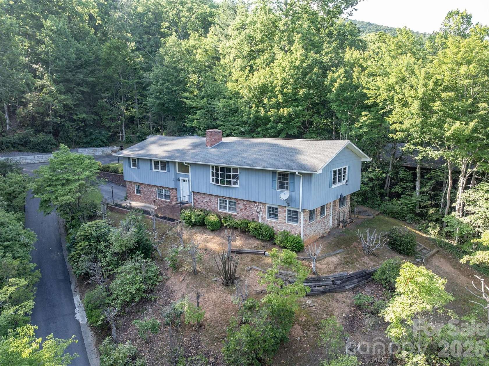 1.5 Acres of Land with Home for Sale in Black Mountain, North Carolina
