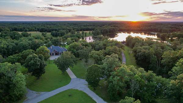 423 Acres of Land with Home for Sale in Harrisburg, Missouri