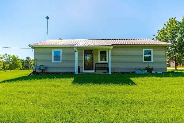 10.2 Acres of Land with Home for Sale in Thompson, Missouri
