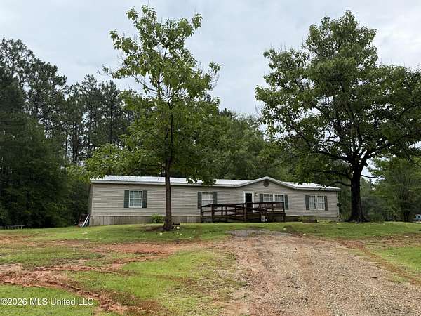 4.4 Acres of Land with Home for Sale in McHenry, Mississippi