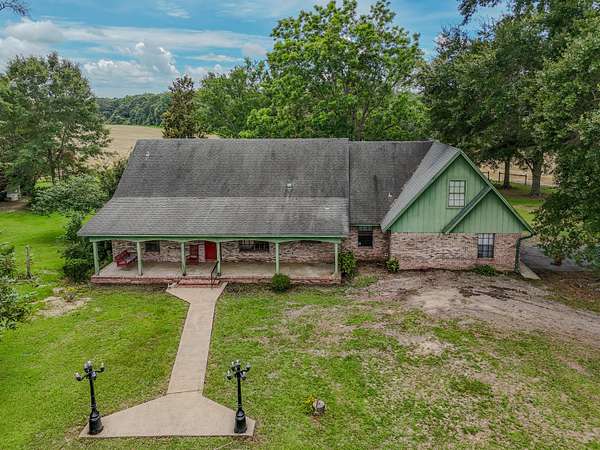 156 Acres of Land with Home for Sale in Laurel Hill, Florida