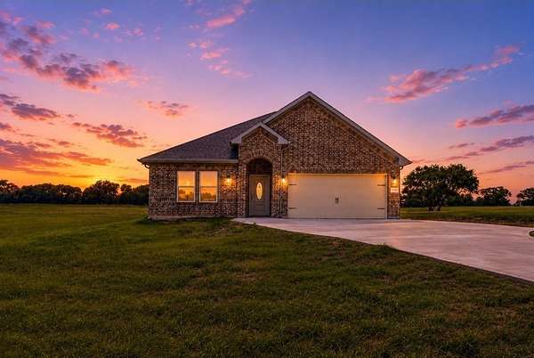 2.5 Acres of Land with Home for Sale in Savoy, Texas