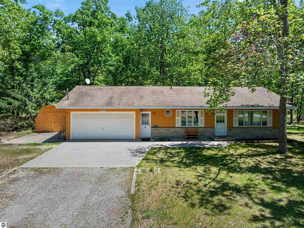 1.54 Acres of Land with Home for Sale in Lewiston, Michigan