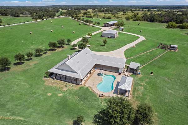 53.3 Acres of Agricultural Land with Home for Sale in Bedias, Texas