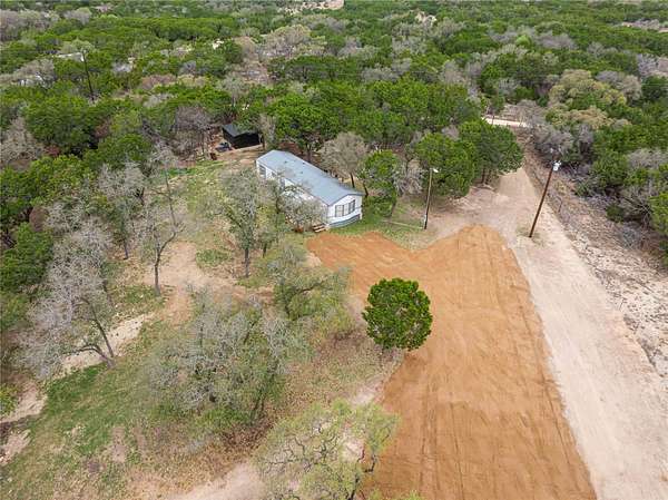 5.84 Acres of Land with Home for Sale in Bertram, Texas
