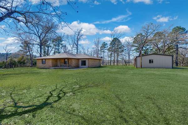 16.1 Acres of Land with Home for Sale in Palestine, Texas