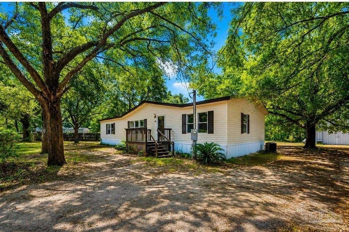 2.17 Acres of Land with Home for Sale in Milton, Florida