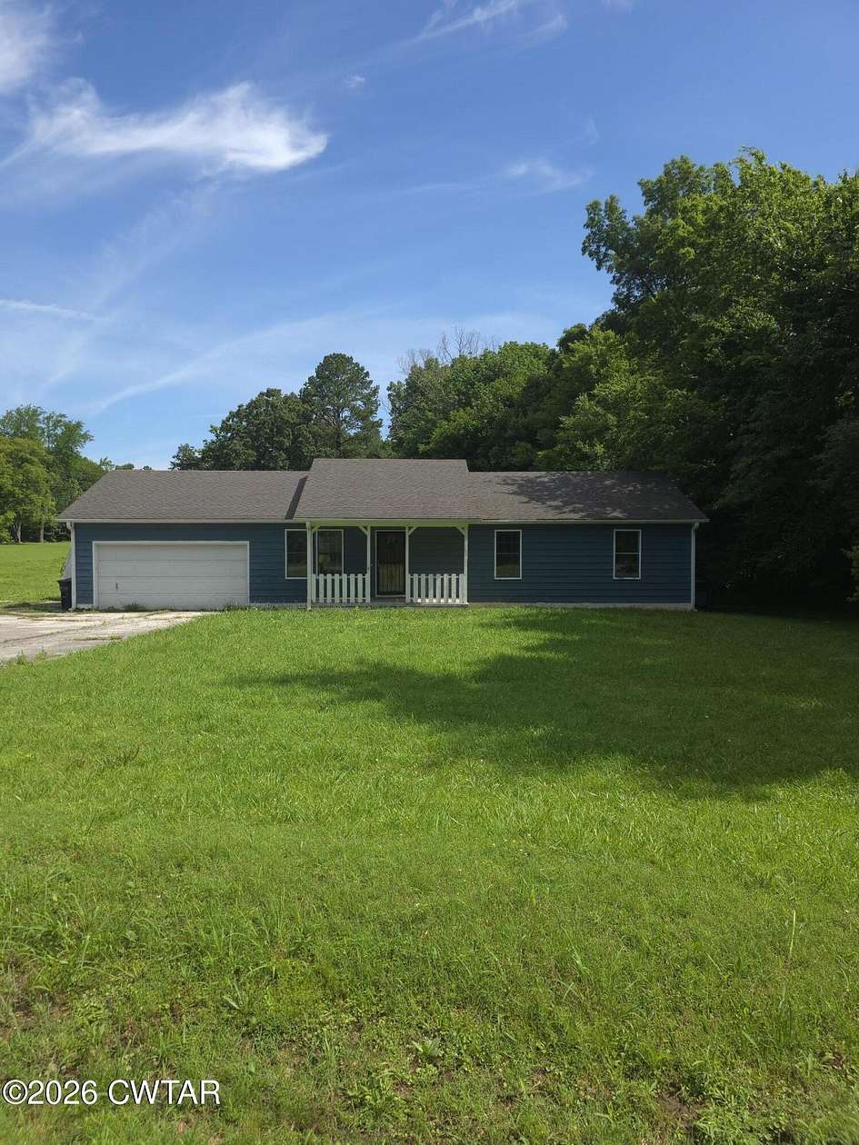 1.5 Acres of Land with Home for Sale in Beech Bluff, Tennessee