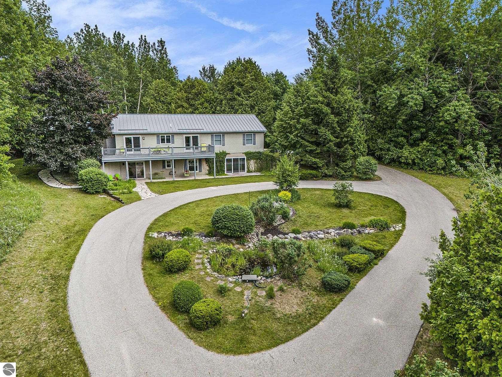 2.55 Acres of Land with Home for Sale in Frankfort, Michigan