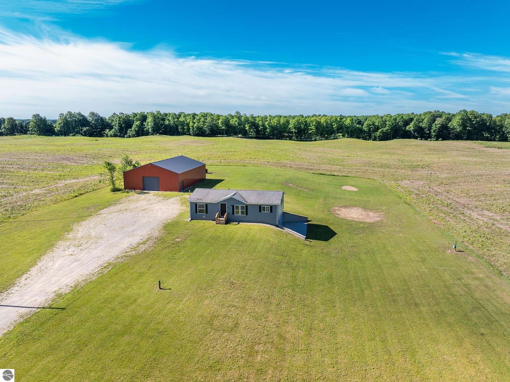 2.5 Acres of Land with Home for Sale in Buckley, Michigan