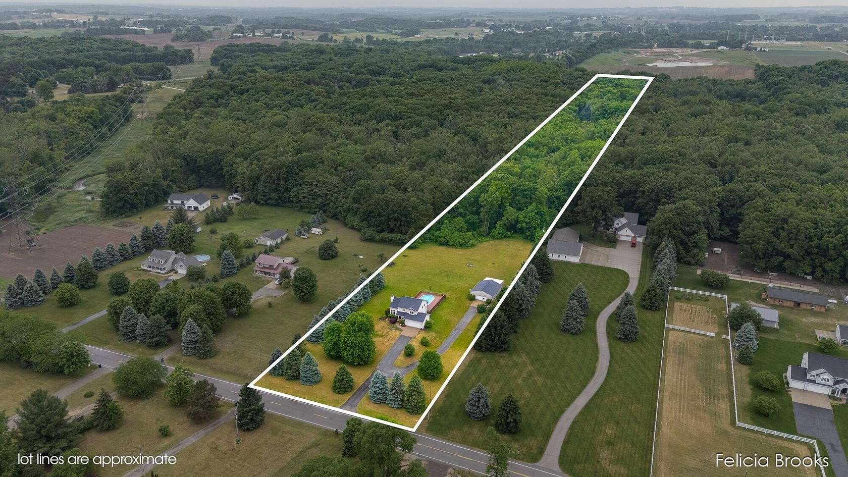 11.8 Acres of Recreational Land with Home for Sale in Dorr, Michigan