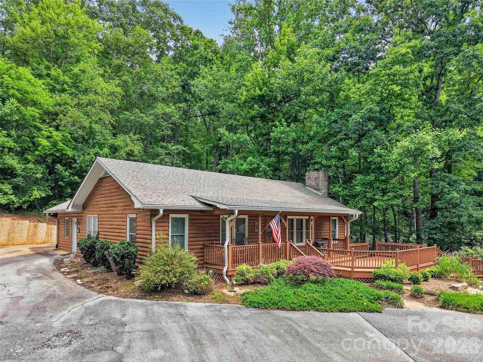 33.6 Acres of Recreational Land with Home for Sale in Hendersonville, North Carolina