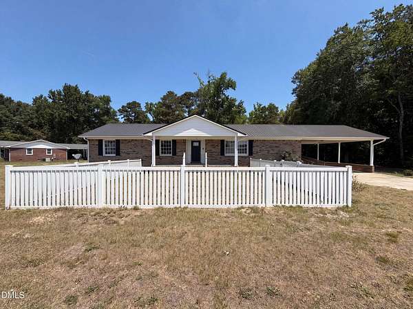1.5 Acres of Land with Home for Sale in Hope Mills, North Carolina