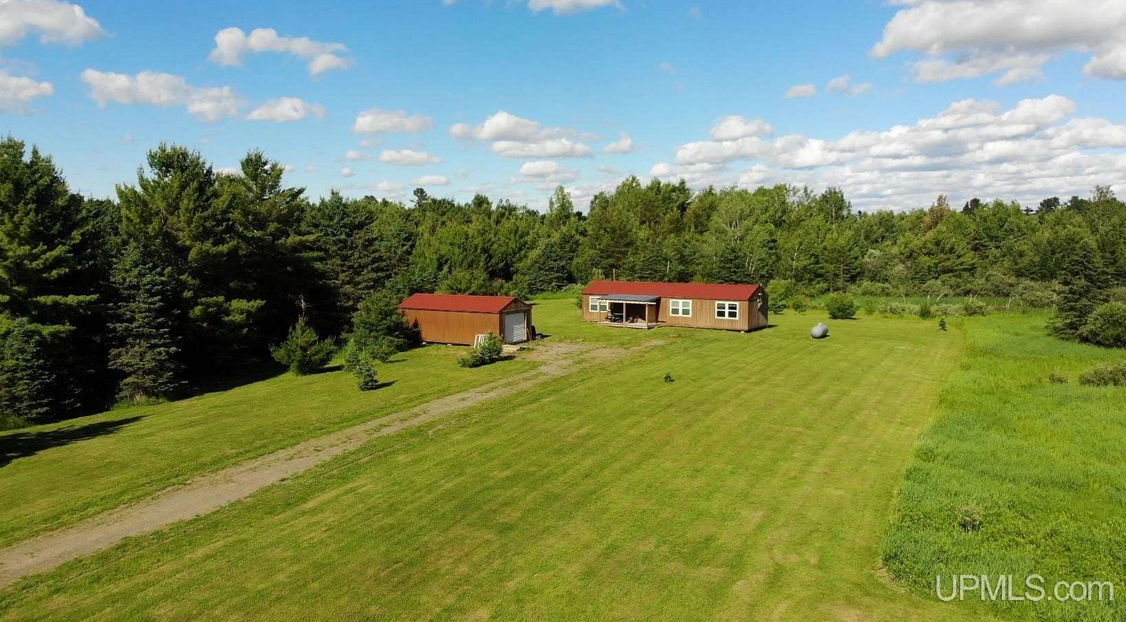 80 Acres of Recreational Land with Home for Sale in Kenton, Michigan