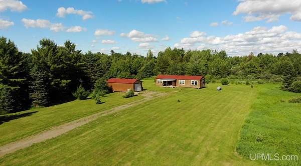 80 Acres of Recreational Land with Home for Sale in Kenton, Michigan