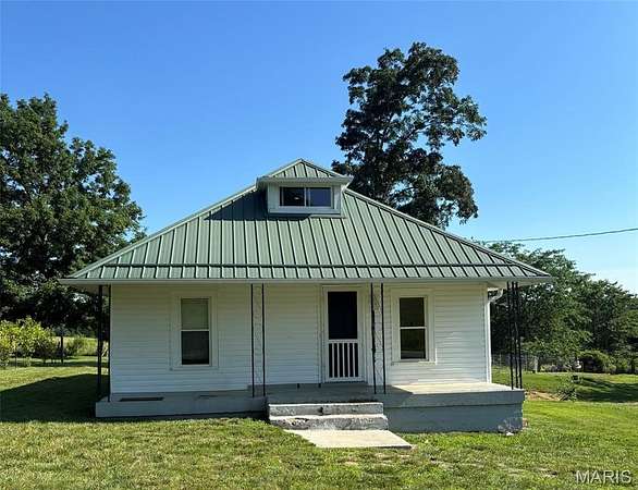 3.4 Acres of Land with Home for Sale in Glen Allen, Missouri