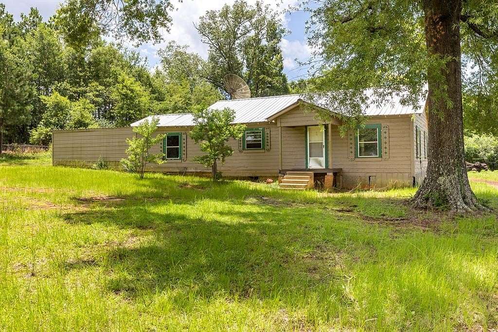 1.64 Acres of Land with Home for Sale in San Augustine, Texas