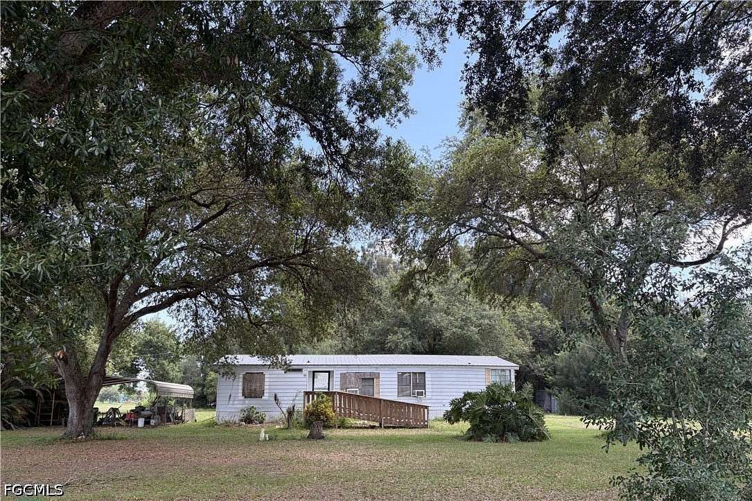 2.87 Acres of Land with Home for Sale in Clewiston, Florida