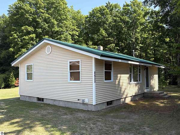 60.8 Acres of Land with Home for Sale in Fife Lake, Michigan