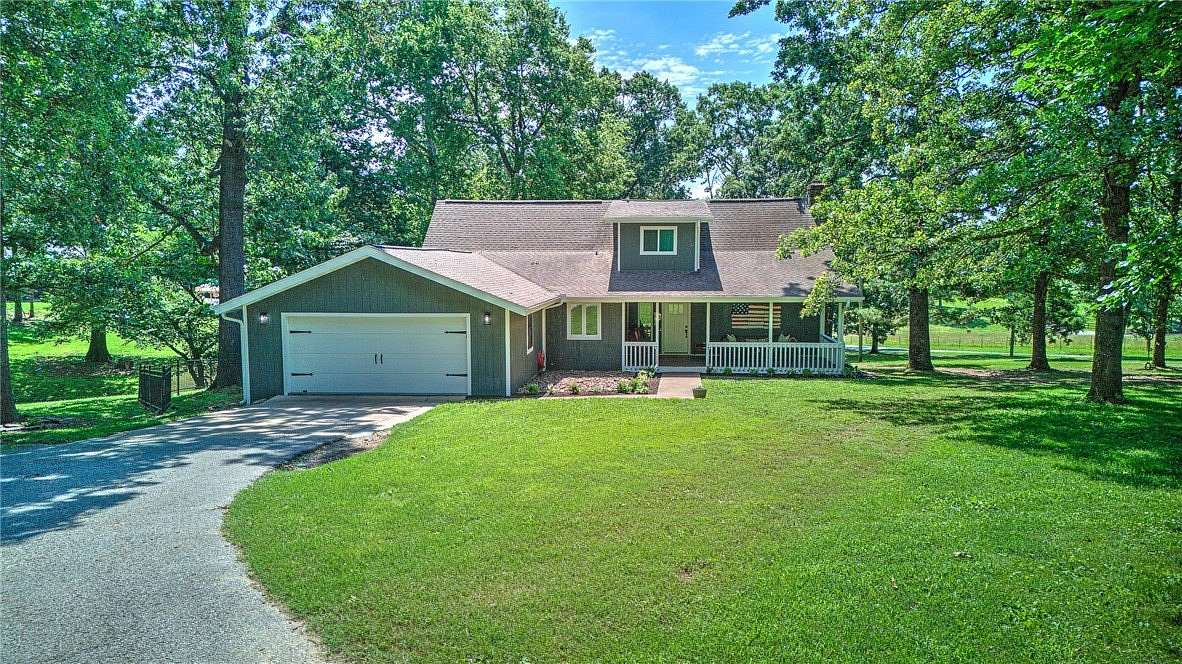 3.18 Acres of Land with Home for Sale in Lowell, Arkansas