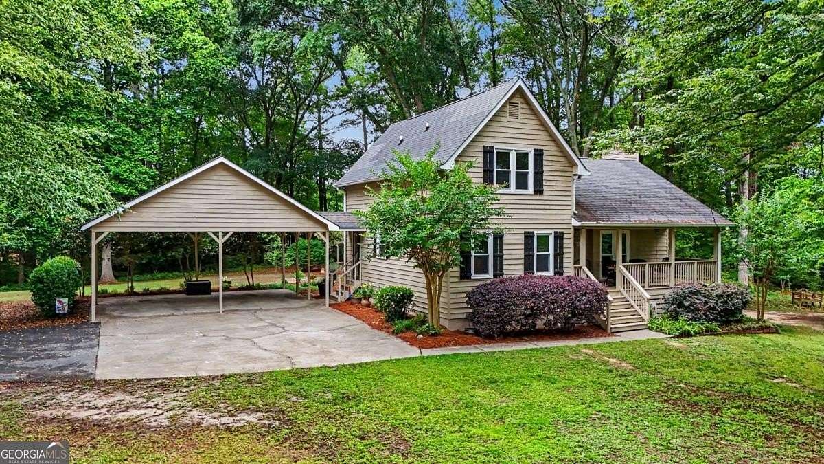 2.4 Acres of Land with Home for Sale in Powder Springs, Georgia