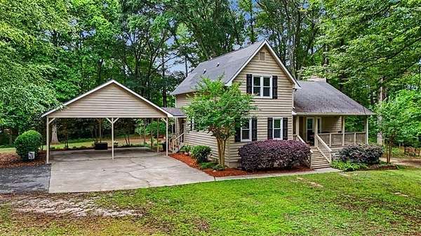 2.4 Acres of Land with Home for Sale in Powder Springs, Georgia
