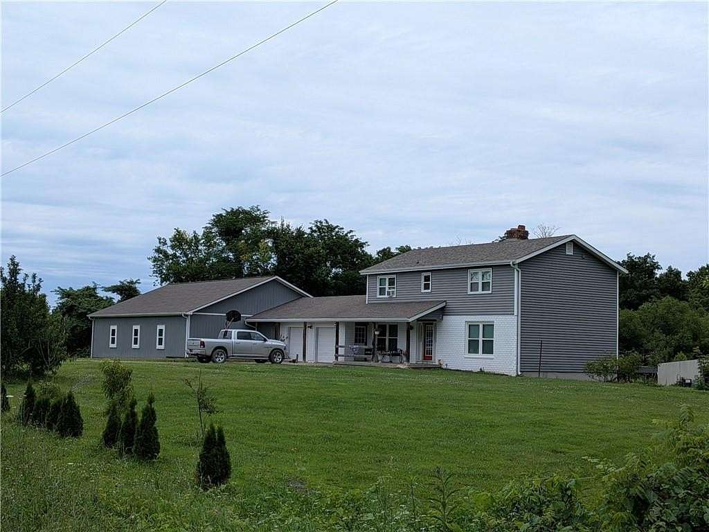 19.7 Acres of Land with Home for Sale in Garden City, Missouri