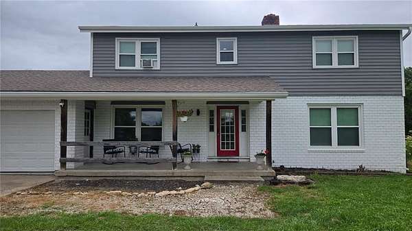19.7 Acres of Land with Home for Sale in Garden City, Missouri