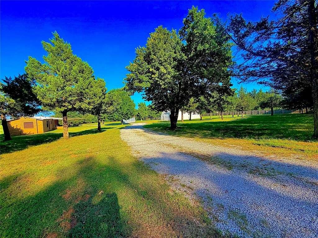 5 Acres of Land with Home for Sale in Edmond, Oklahoma