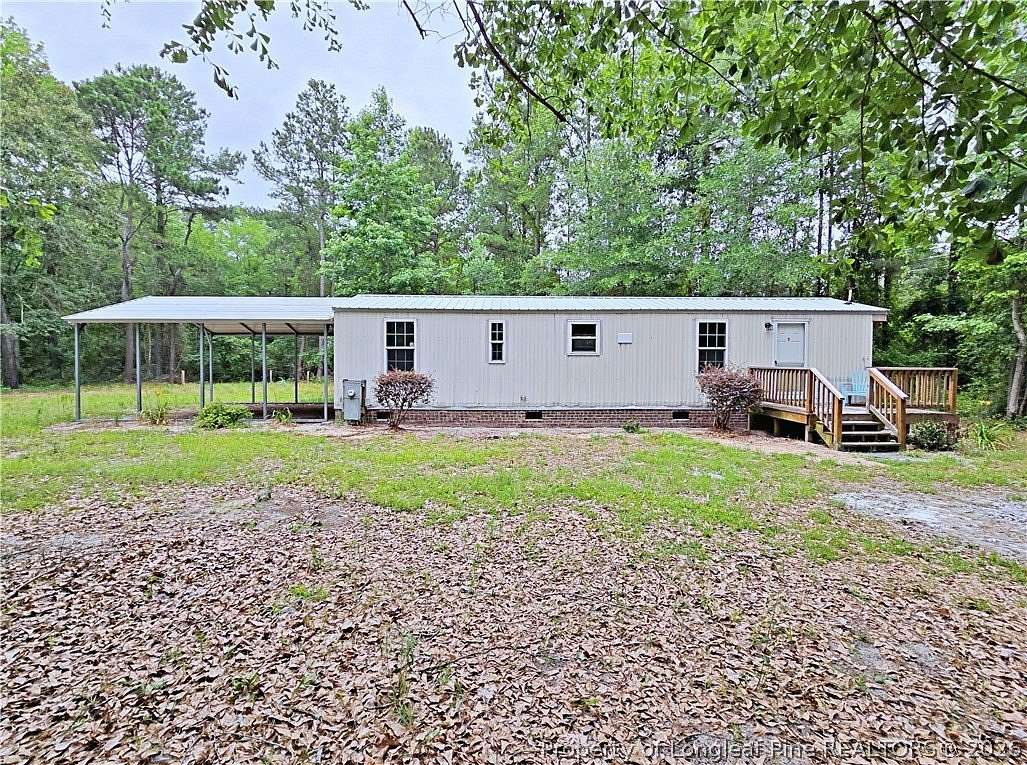 8 Acres of Land with Home for Sale in White Oak, North Carolina