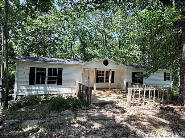 1.57 Acres of Land with Home for Sale in Rocky Mount, Missouri