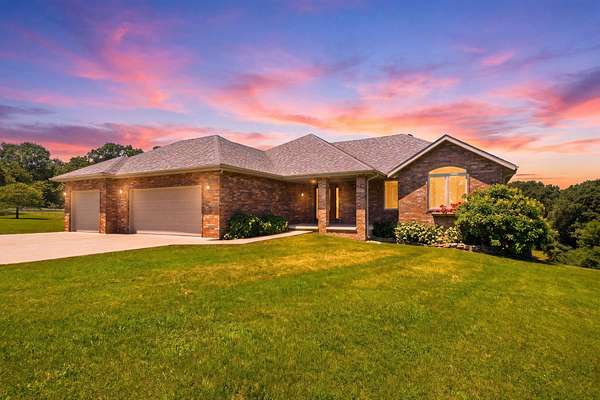 40.2 Acres of Recreational Land with Home for Sale in Crane, Missouri