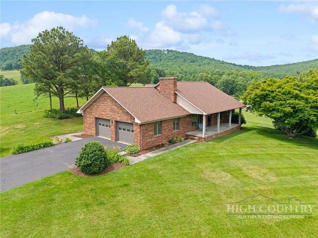 26.7 Acres of Land with Home for Sale in Crumpler, North Carolina
