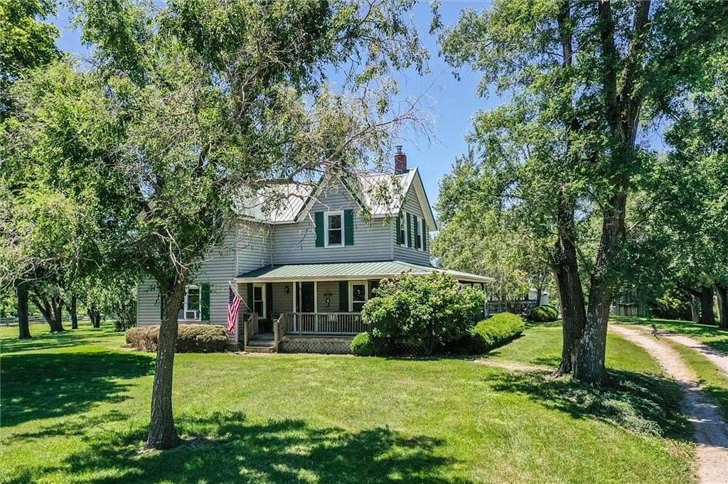 13.2 Acres of Land with Home for Sale in Amoret, Missouri