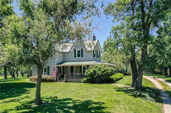13.2 Acres of Land with Home for Sale in Amoret, Missouri