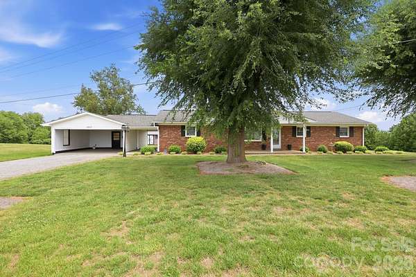 3.5 Acres of Land with Home for Sale in Boonville, North Carolina