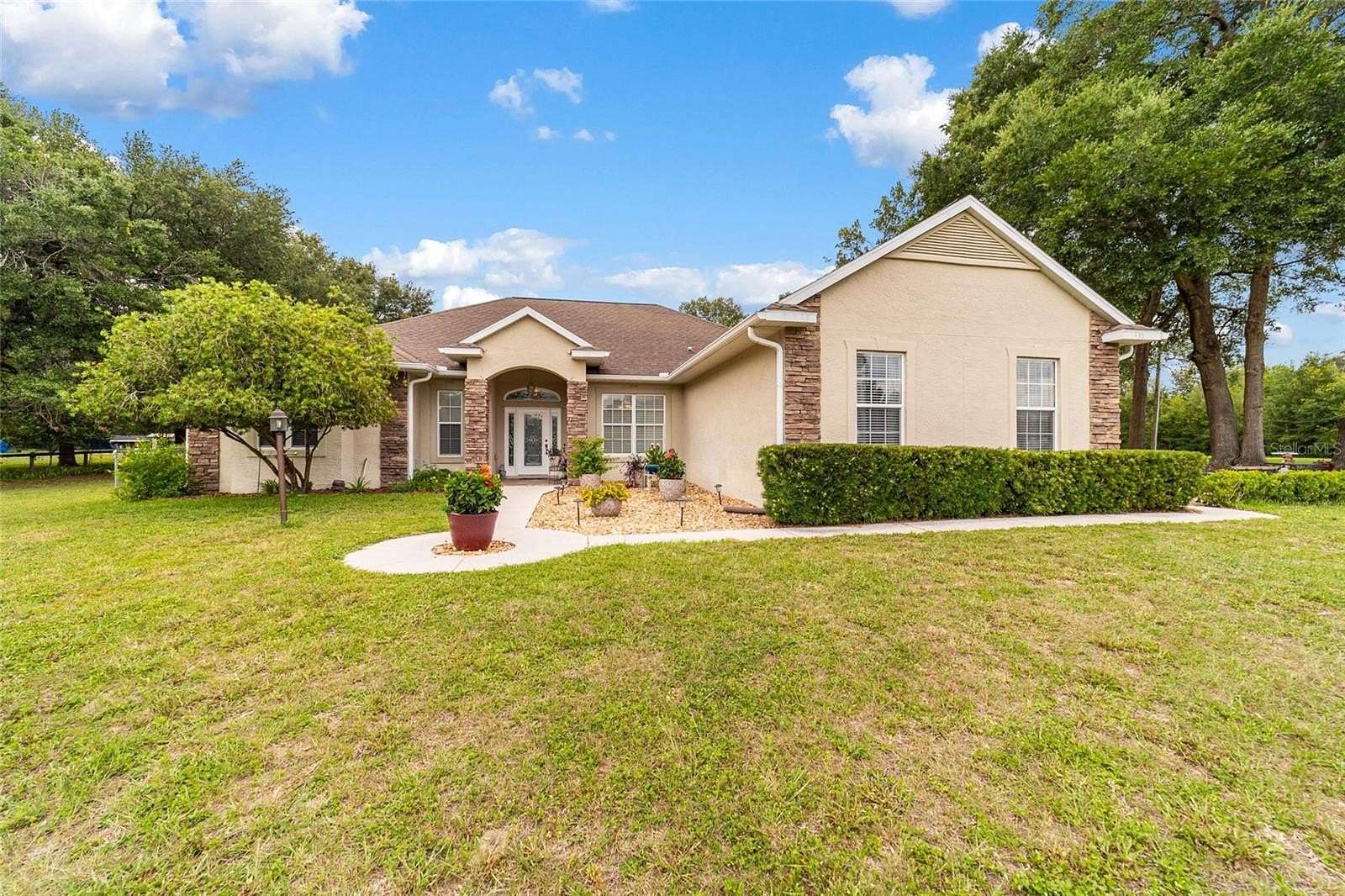 3.87 Acres of Land with Home for Sale in Citra, Florida