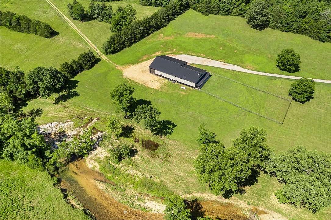 25 Acres of Land with Home for Sale in Lead Hill, Arkansas