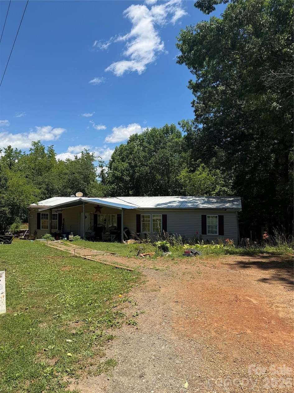 13.6 Acres of Land with Home for Sale in Lake Lure, North Carolina