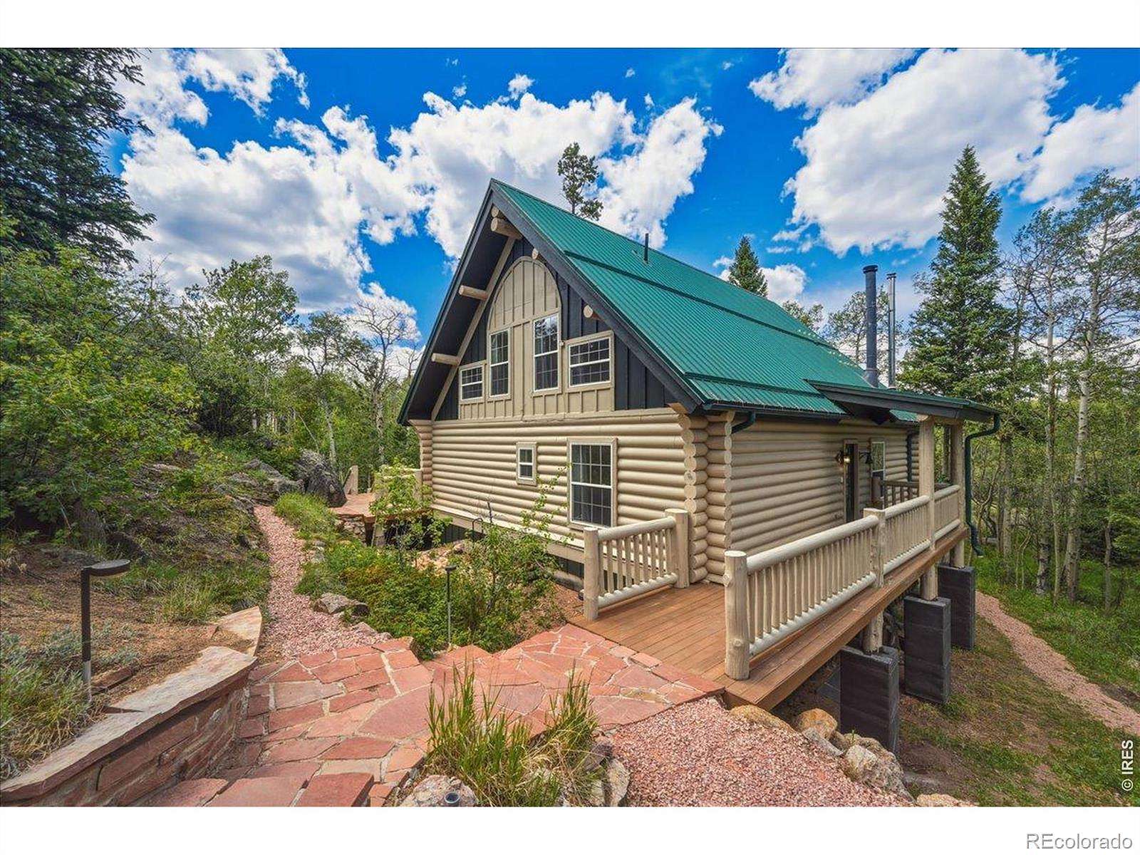 2.49 Acres of Land with Home for Sale in Red Feather Lakes, Colorado