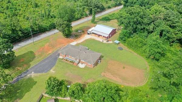9.6 Acres of Land with Home for Sale in Valley, Alabama