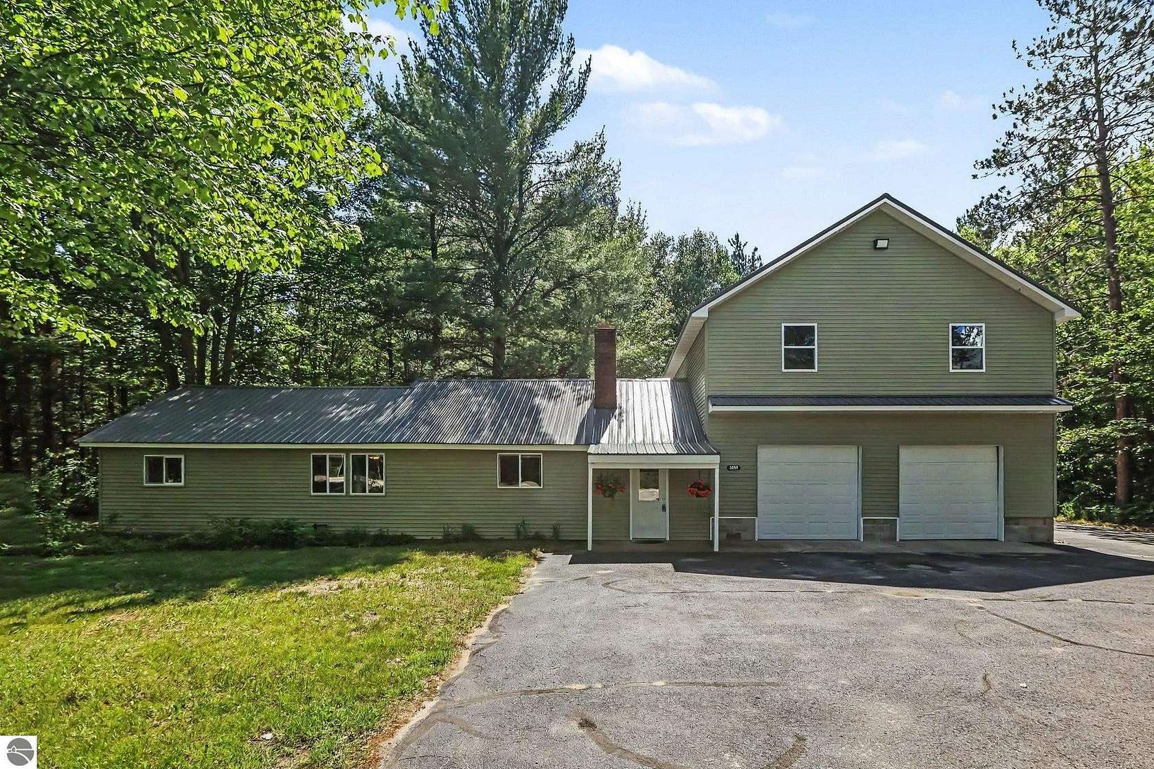 2 Acres of Land with Home for Sale in Kalkaska, Michigan