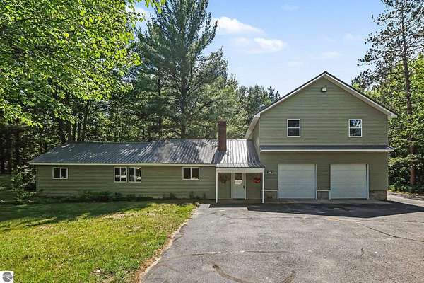 5 Acres of Land with Home for Sale in Kalkaska, Michigan