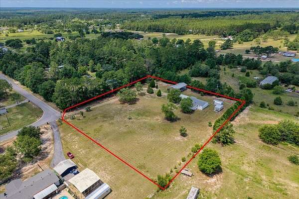 2.43 Acres of Land with Home for Sale in Milton, Florida
