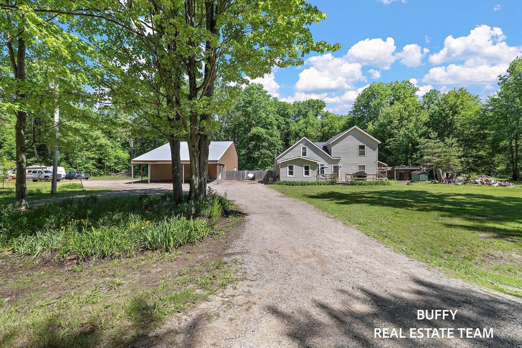 10 Acres of Recreational Land with Home for Sale in Grant, Michigan