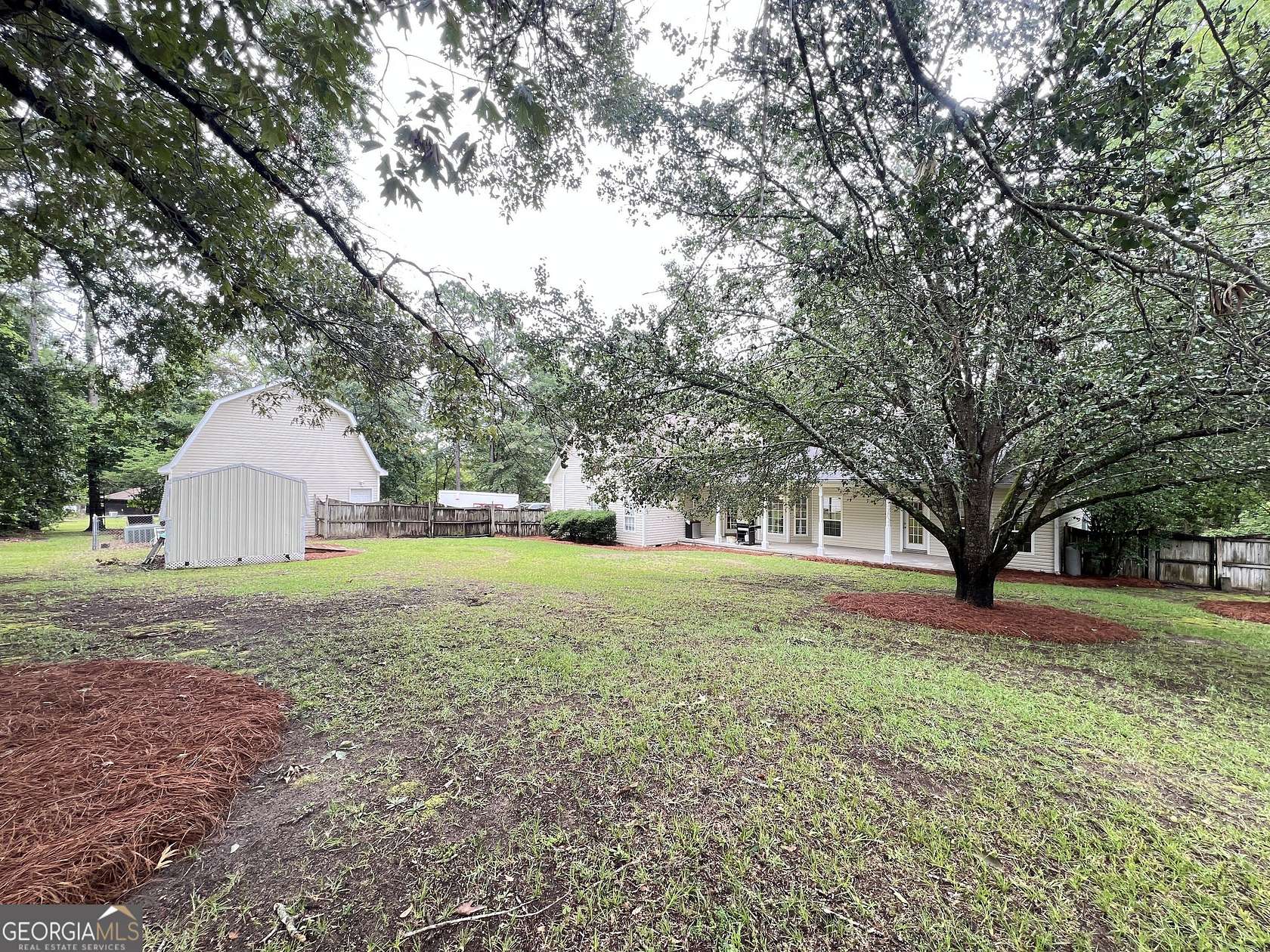 1.56 Acres of Land with Home for Sale in Byron, Georgia
