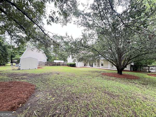 1.56 Acres of Land with Home for Sale in Byron, Georgia