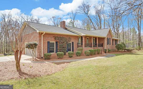 2.54 Acres of Land with Home for Sale in Dewy Rose, Georgia